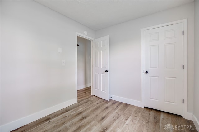 3183 Myers Tillman Rd, Arcanum, OH 45304 - unfurnished bedroom with light wood-style floors