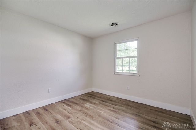 3183 Myers Tillman Rd, Arcanum, OH 45304 - spare room with baseboards and wood finished floors