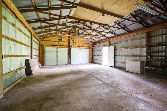 3183 Myers Tillman Rd, Arcanum, OH 45304 - garage with a garage door opener and refrigerator