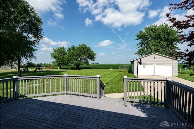 3183 Myers Tillman Rd, Arcanum, OH 45304 - wooden deck with an outbuilding, a garage, a yard, and a rural view