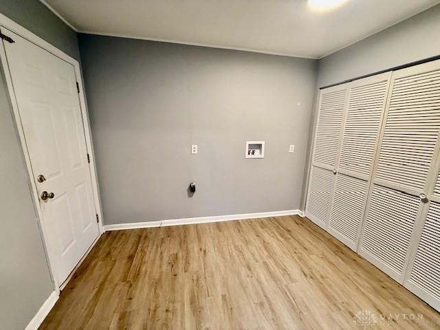 135 B St, Wilmington, OH 45177 - laundry room with washer hookup and light wood finished floors