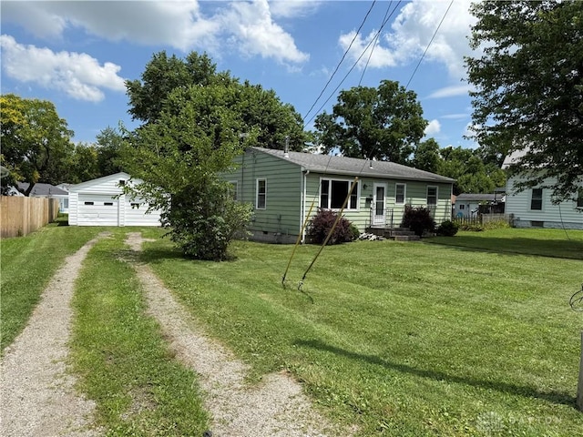 135 B St, Wilmington, OH 45177 - view of front of property featuring driveway, crawl space, and a detached garage