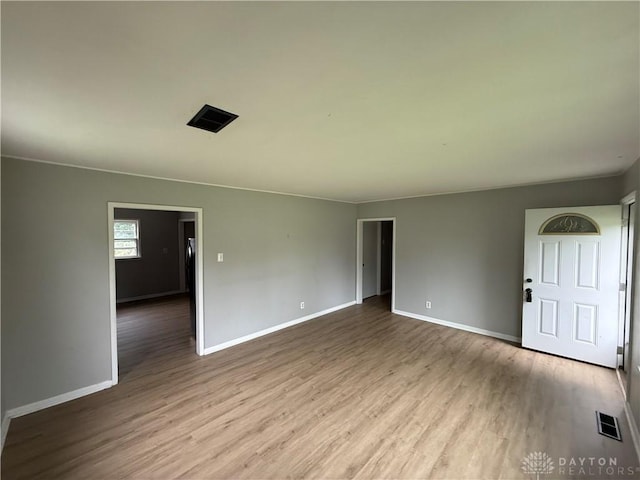 135 B St, Wilmington, OH 45177 - spare room featuring wood finished floors