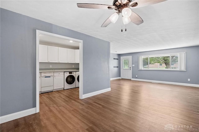 829 E Stroop Rd, Kettering, OH 45429 - unfurnished living room with a ceiling fan and wood finished floors