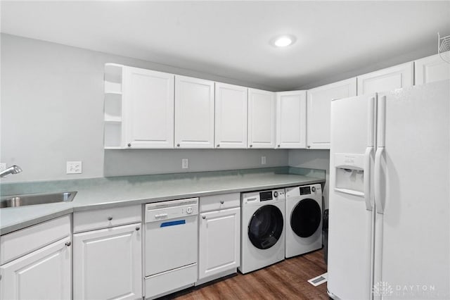 829 E Stroop Rd, Kettering, OH 45429 - laundry room with washer and clothes dryer and dark wood-style floors