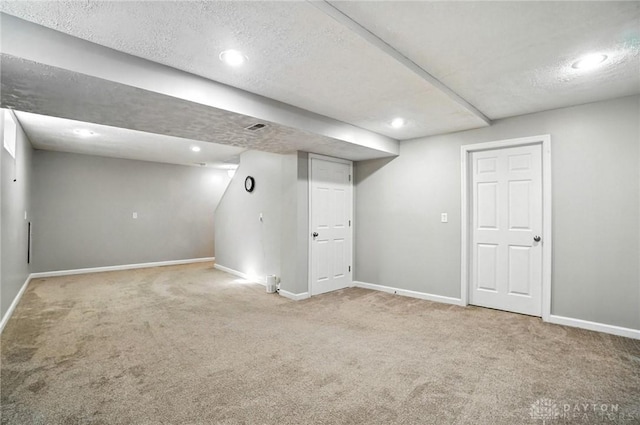 3492 King Edward Way, Beavercreek, OH 45431 - finished basement with carpet floors, a textured ceiling, and recessed lighting