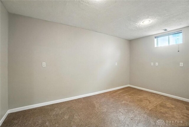 3492 King Edward Way, Beavercreek, OH 45431 - carpeted spare room featuring a textured ceiling and baseboards