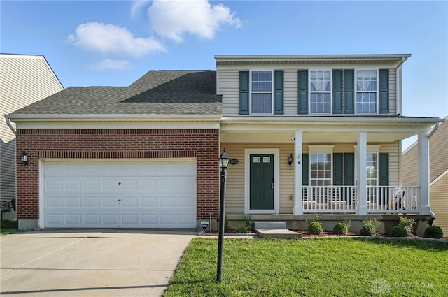 3492 King Edward Way, Beavercreek, OH 45431 - view of front facade featuring covered porch, driveway, brick siding, and a front lawn