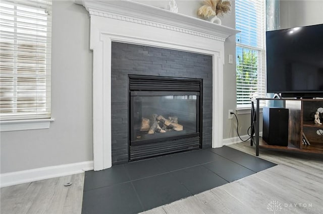 3492 King Edward Way, Beavercreek, OH 45431 - detailed view of a glass covered fireplace and wood finished floors