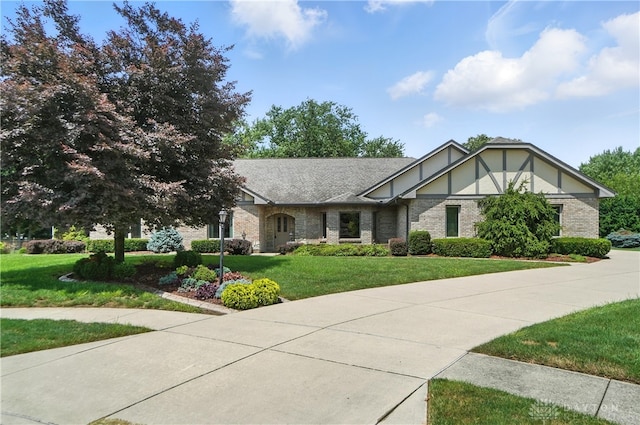 3820 Shagbark Ln, Beavercreek, OH 45440 - english style home with brick siding and a front lawn