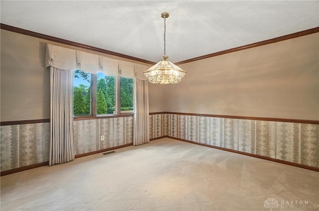 3820 Shagbark Ln, Beavercreek, OH 45440 - spare room with wallpapered walls, a chandelier, and ornamental molding