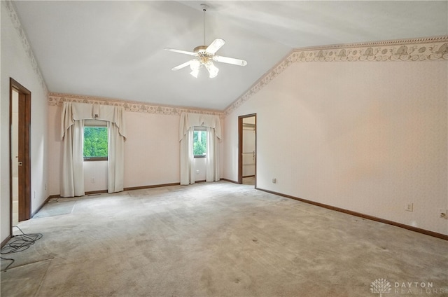 3820 Shagbark Ln, Beavercreek, OH 45440 - empty room featuring vaulted ceiling, a ceiling fan, and light carpet