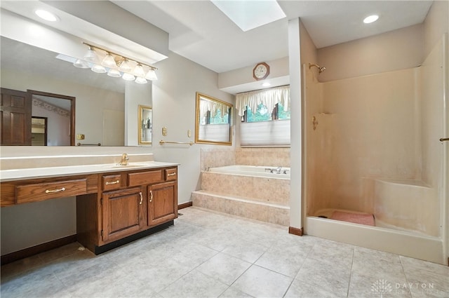 3820 Shagbark Ln, Beavercreek, OH 45440 - bathroom with a garden tub, vanity, a skylight, and a shower