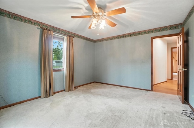3820 Shagbark Ln, Beavercreek, OH 45440 - spare room with light carpet and ceiling fan