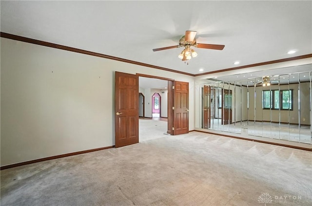 3820 Shagbark Ln, Beavercreek, OH 45440 - unfurnished room with a ceiling fan, crown molding, light carpet, and recessed lighting