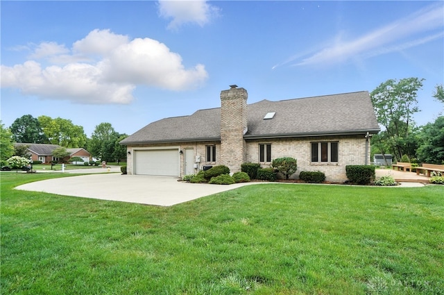 3820 Shagbark Ln, Beavercreek, OH 45440 - view of front of property with a front lawn, a garage, driveway, and a chimney