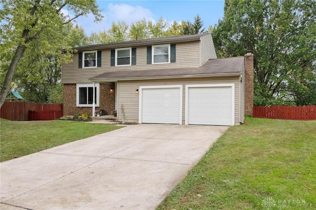5431 Flicker Way, Dayton, OH 45424 - traditional-style home with driveway, a chimney, and brick siding