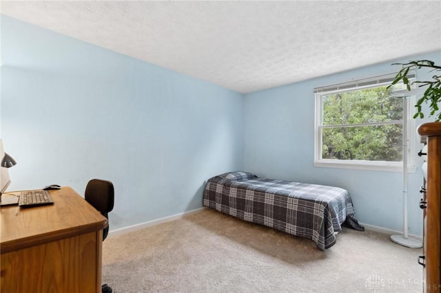 5431 Flicker Way, Dayton, OH 45424 - carpeted bedroom featuring a textured ceiling and an office area