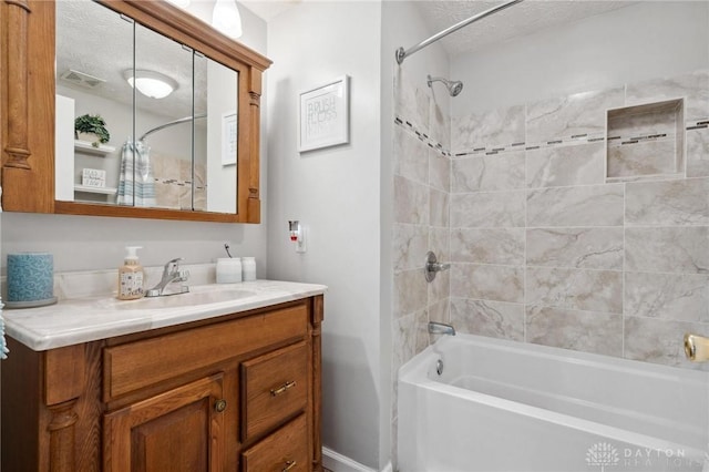5431 Flicker Way, Dayton, OH 45424 - bathroom with vanity, shower / bathtub combination, and a textured ceiling