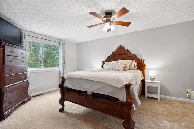 5431 Flicker Way, Dayton, OH 45424 - bedroom with light colored carpet, a textured ceiling, and ceiling fan