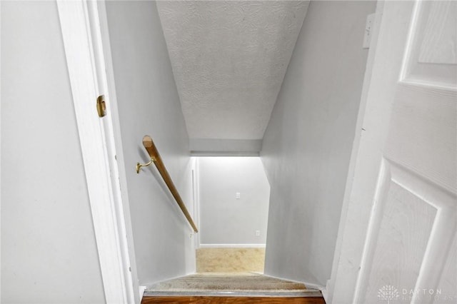 5431 Flicker Way, Dayton, OH 45424 - stairway featuring a textured ceiling