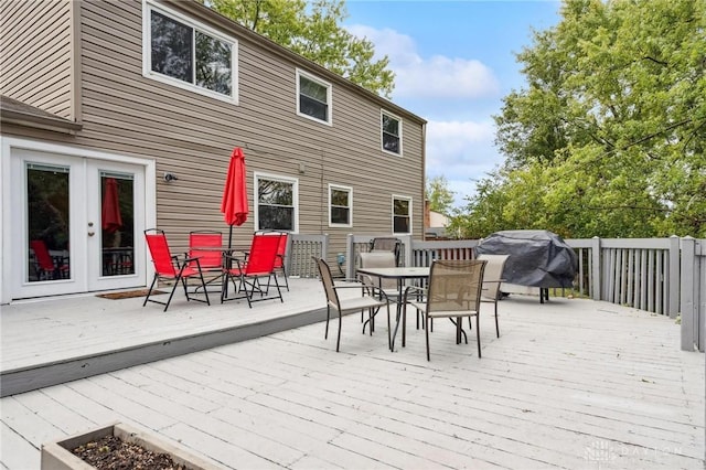5431 Flicker Way, Dayton, OH 45424 - wooden terrace with outdoor dining space, area for grilling, and french doors