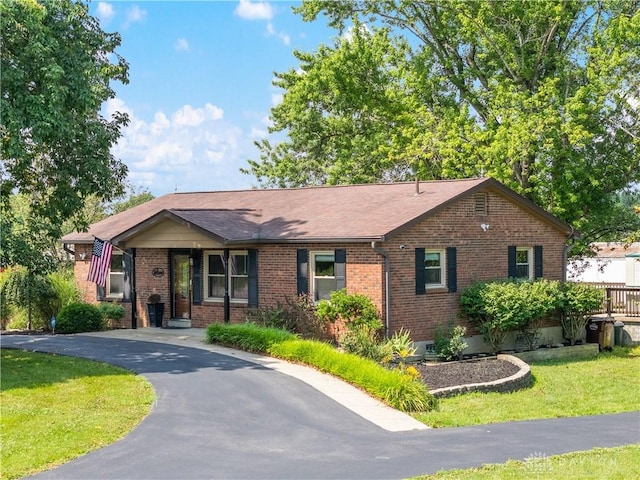 19551 US Highway 68, Fayetteville, OH 45118 - ranch-style home with brick siding, a front lawn, roof with shingles, and asphalt driveway