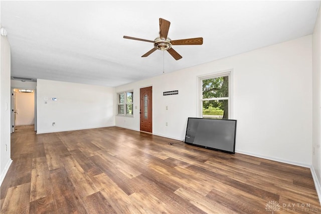 19551 US Highway 68, Fayetteville, OH 45118 - unfurnished living room with a ceiling fan and wood finished floors