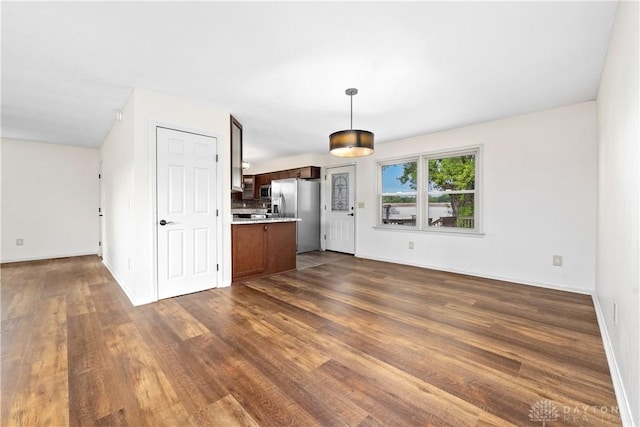 19551 US Highway 68, Fayetteville, OH 45118 - unfurnished living room with dark wood finished floors and baseboards