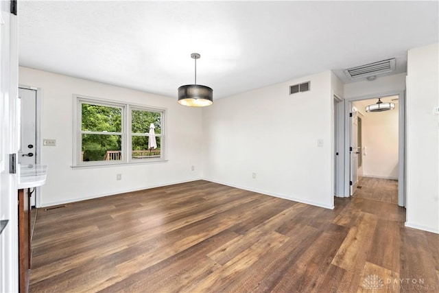 19551 US Highway 68, Fayetteville, OH 45118 - unfurnished dining area with dark wood-style flooring and baseboards