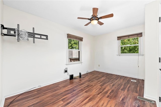 19551 US Highway 68, Fayetteville, OH 45118 - spare room with healthy amount of natural light, dark wood finished floors, and a ceiling fan