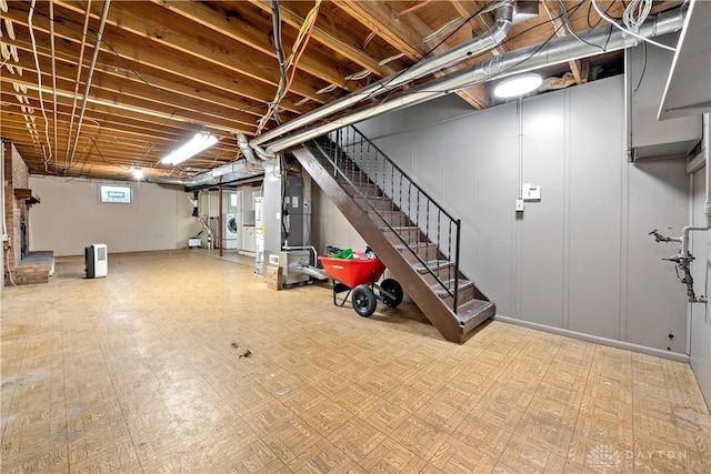 19551 US Highway 68, Fayetteville, OH 45118 - below grade area featuring washer / clothes dryer, stairway, and heating unit