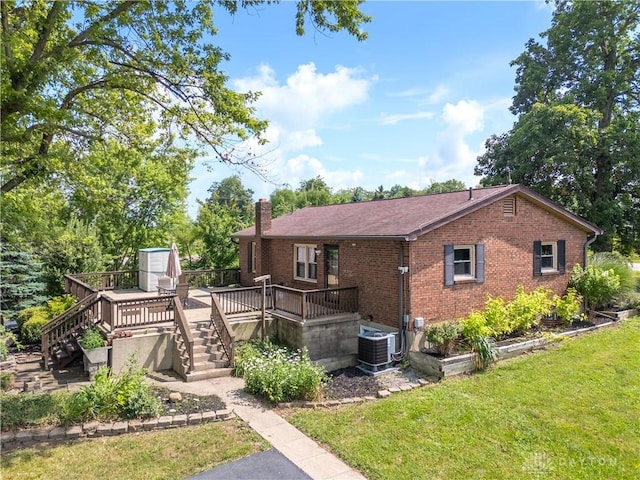 19551 US Highway 68, Fayetteville, OH 45118 - back of property featuring brick siding, stairway, a wooden deck, a lawn, and a chimney