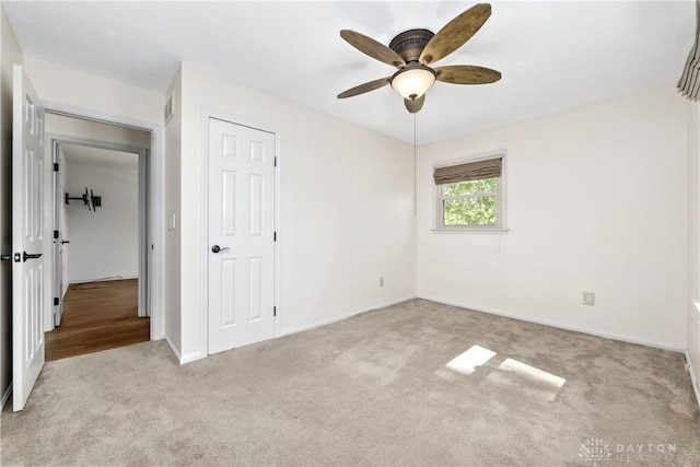 19551 US Highway 68, Fayetteville, OH 45118 - unfurnished bedroom with carpet flooring, a ceiling fan, and a closet