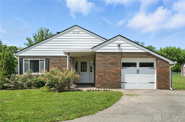 4503 Central Ave, Middletown, OH 45044 - single story home with brick siding, driveway, and an attached garage