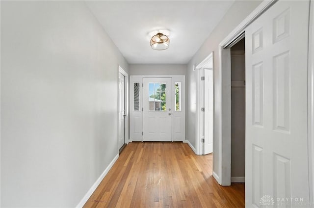 4503 Central Ave, Middletown, OH 45044 - doorway to outside featuring baseboards and light wood-style flooring