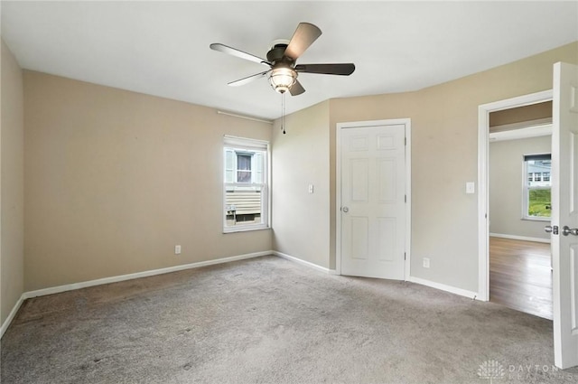 4503 Central Ave, Middletown, OH 45044 - unfurnished bedroom with carpet, multiple windows, and ceiling fan