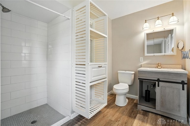 4503 Central Ave, Middletown, OH 45044 - bathroom with a tile shower, wood finished floors, and vanity