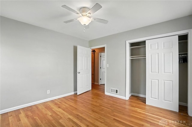 4503 Central Ave, Middletown, OH 45044 - unfurnished bedroom with light wood-style floors, a closet, and ceiling fan
