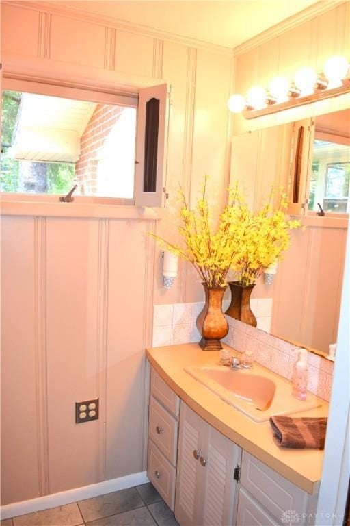 3235 W Ziegler Rd, Piqua, OH 45356 - bathroom with vanity, decorative backsplash, and tile patterned floors