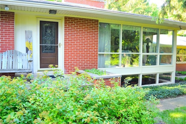 3235 W Ziegler Rd, Piqua, OH 45356 - view of exterior entry with brick siding