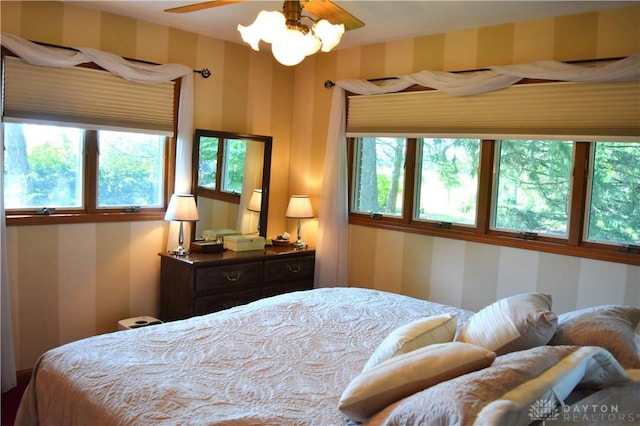 3235 W Ziegler Rd, Piqua, OH 45356 - bedroom with wallpapered walls and multiple windows