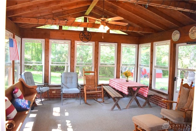 3235 W Ziegler Rd, Piqua, OH 45356 - sunroom featuring vaulted ceiling, healthy amount of natural light, a ceiling fan, and carpet flooring