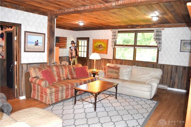 3235 W Ziegler Rd, Piqua, OH 45356 - living room with wallpapered walls, wood ceiling, wainscoting, baseboard heating, and wood finished floors