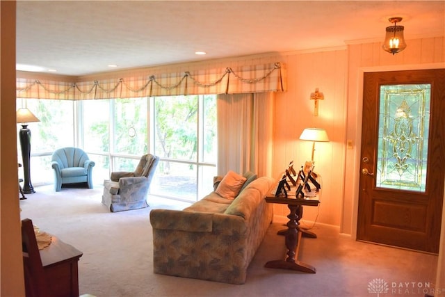 3235 W Ziegler Rd, Piqua, OH 45356 - living area with carpet flooring, healthy amount of natural light, and crown molding