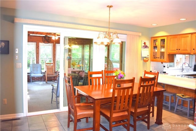3235 W Ziegler Rd, Piqua, OH 45356 - tiled dining room featuring a chandelier and recessed lighting