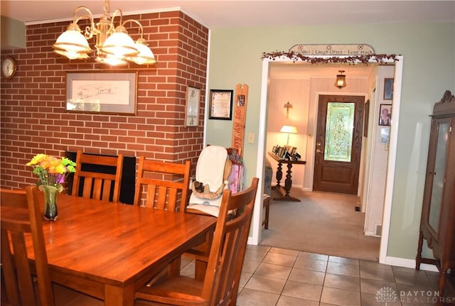 3235 W Ziegler Rd, Piqua, OH 45356 - dining room featuring a chandelier, carpet floors, and tile patterned floors