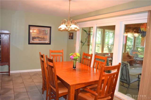 3235 W Ziegler Rd, Piqua, OH 45356 - dining room with a chandelier and dark tile patterned floors