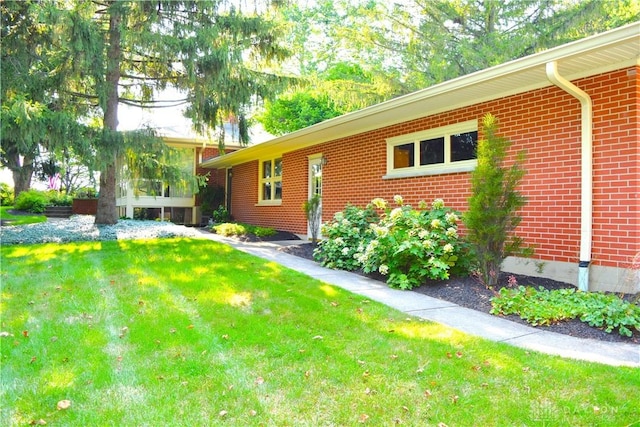 3235 W Ziegler Rd, Piqua, OH 45356 - view of front of house with a front lawn and brick siding