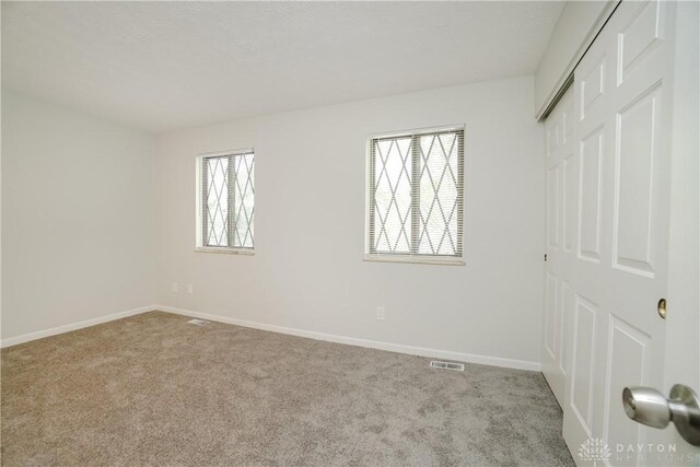 9446 Haddington Ct Unit 200, Cincinnati, OH 45251 - unfurnished bedroom featuring carpet and a closet